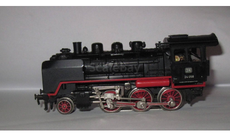 Локомотив , Паровоз BR 24 058 производство Märklin . Масштаб НО 1:87, железнодорожная модель