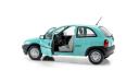 Модель OPEL CORSA B 1993 TURQUOISE 1:24 WhiteBoх, масштабная модель, WHITEBOX, 1/24