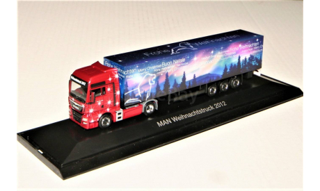 1/87 Herpa MAN TGX 18.440 (4X2) Weihnachtstruck 2012 dark red met./blue, масштабная модель, scale87