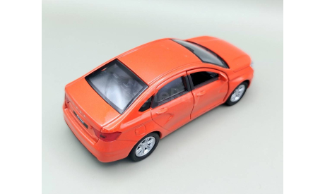 ВАЗ-2180 LADA Vesta Лада Веста (оранжевый) Игрушка Welly М.0925, масштабная модель, scale35