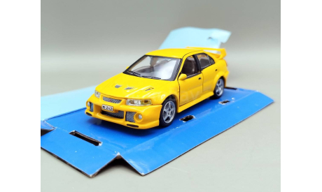 Mitsubishi Lancer Evolution VI (жёлтый) Митсубиси Cararama М.1022, масштабная модель, Bauer/Cararama/Hongwell, scale43