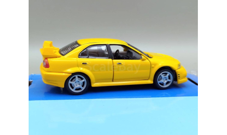 Mitsubishi Lancer Evolution VI (жёлтый) Митсубиси Cararama М.1022, масштабная модель, Bauer/Cararama/Hongwell, scale43