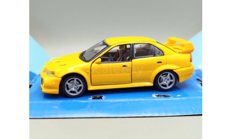 Mitsubishi Lancer Evolution VI (жёлтый) Митсубиси Cararama М.1022, масштабная модель, Bauer/Cararama/Hongwell, scale43
