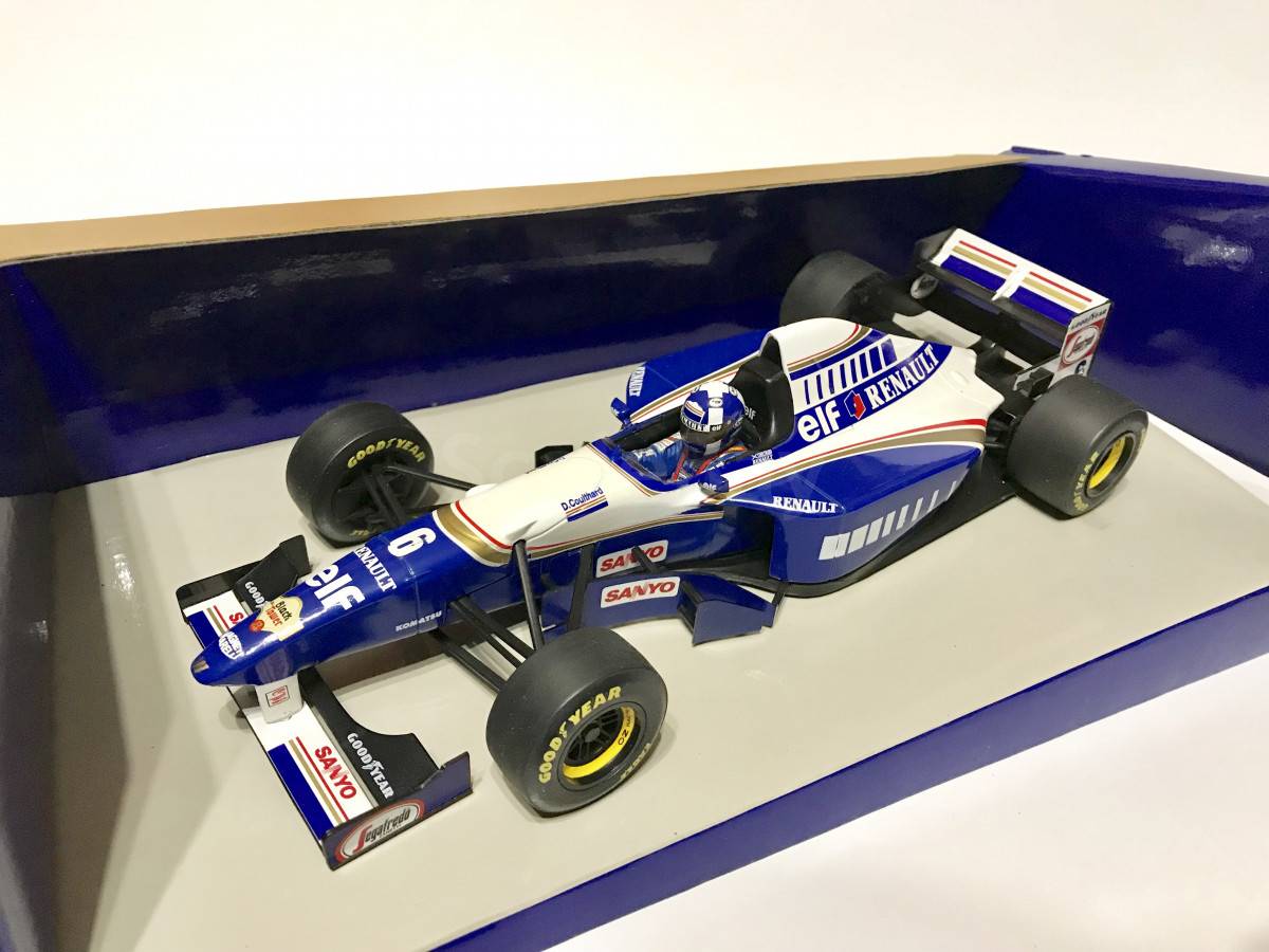 A collectible scale model 1/43 Williams FW17 from Minichamps F1