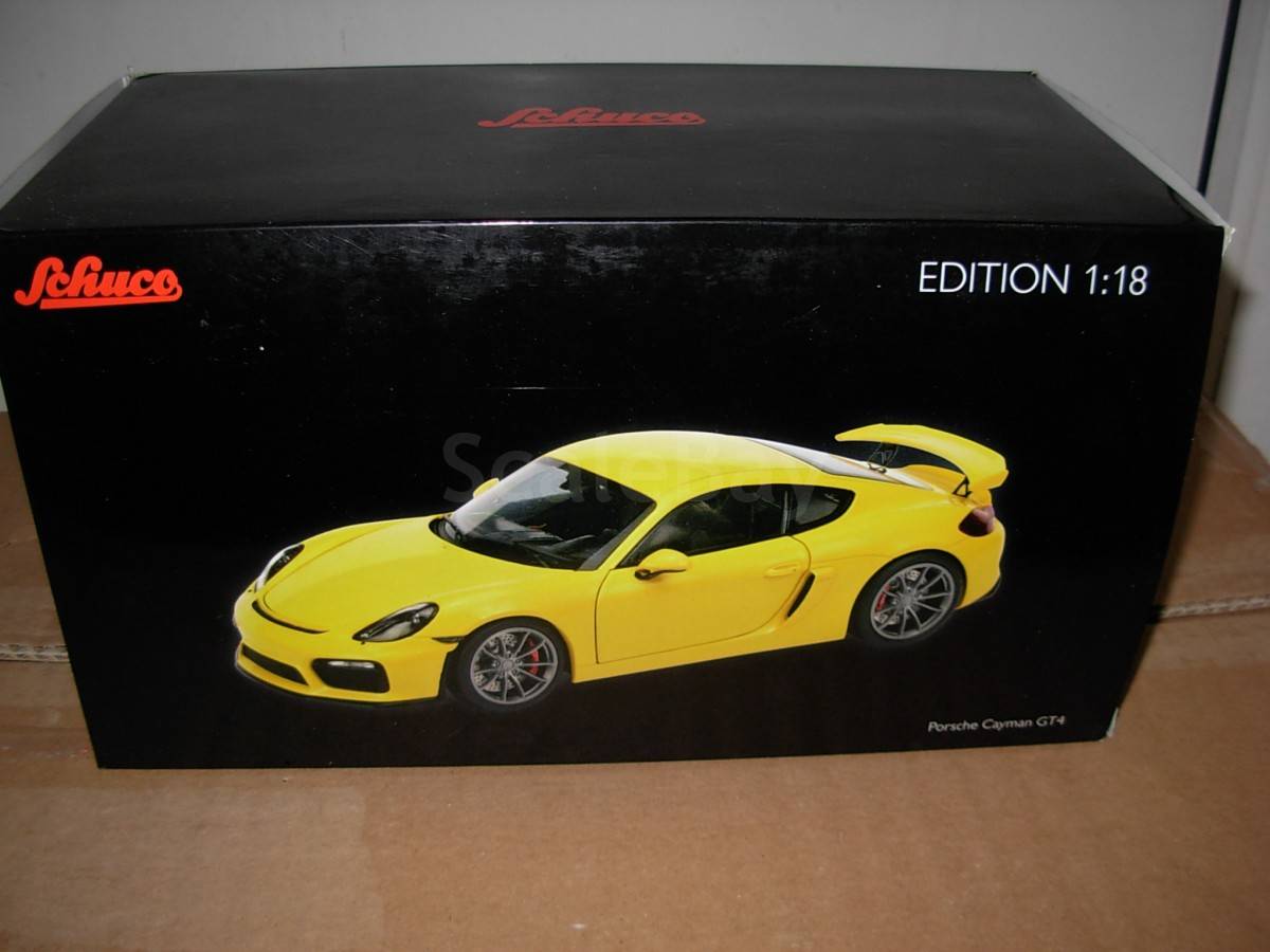 porsche cayman модель 1:43 schuco